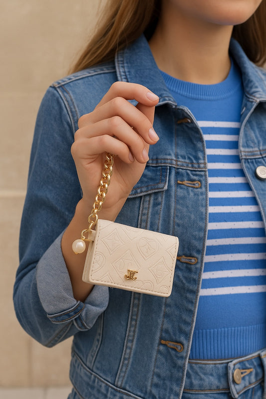 Mini bolso Juicy Couture con cadena dorada